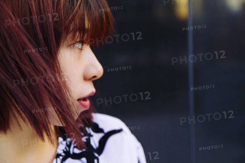 Close up of profile of Chinese woman