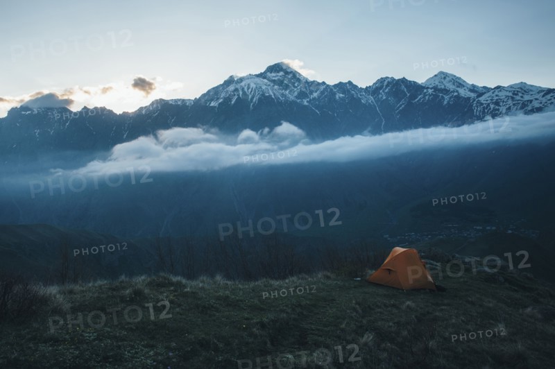 Camping tent in mountain landscape
