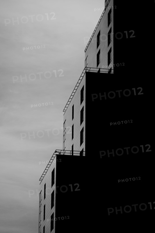 Balconies under cloudy sky