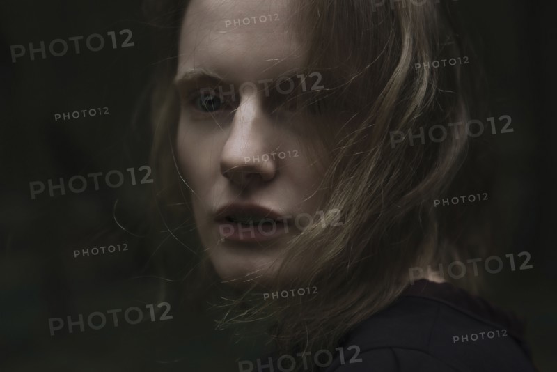 Close up of face of serious Caucasian woman