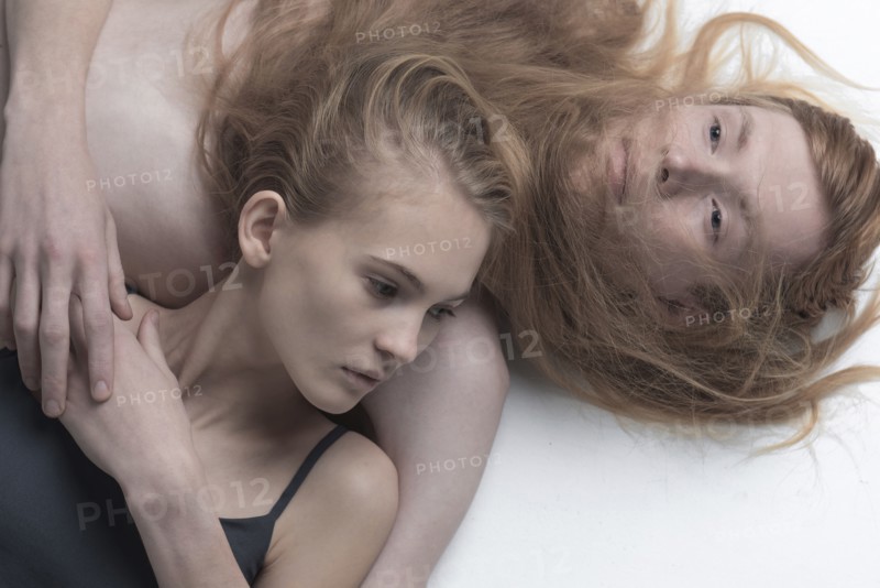 Portrait of serious Caucasian couple relaxing