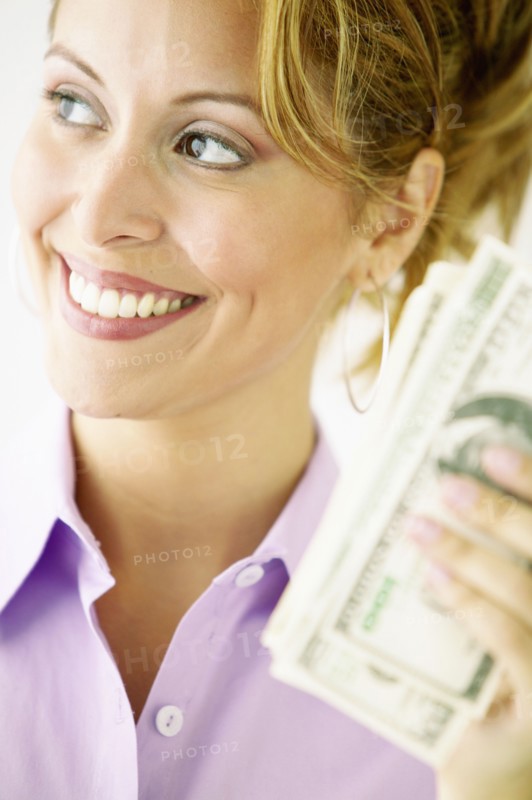 Woman holding cash