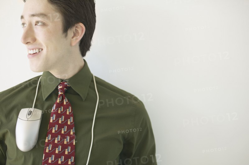 Businessman with computer mouse around neck