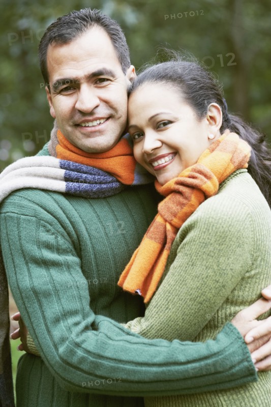Couple hugging outdoors