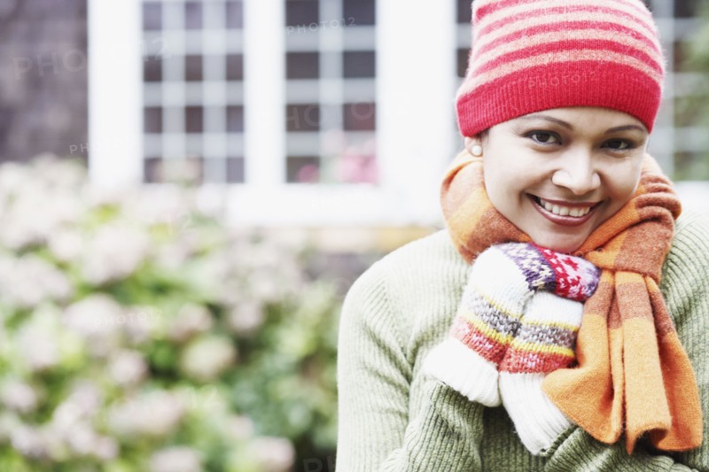 Young woman wearing a scarf outdoors