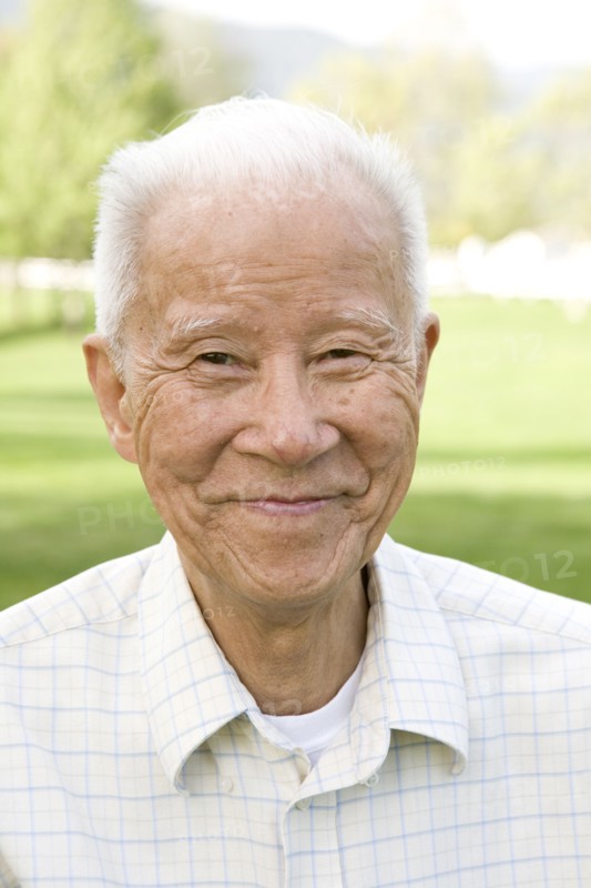 Smiling senior Chinese man