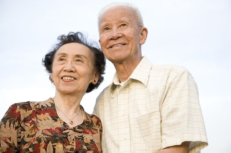 Smiling senior Chinese couple