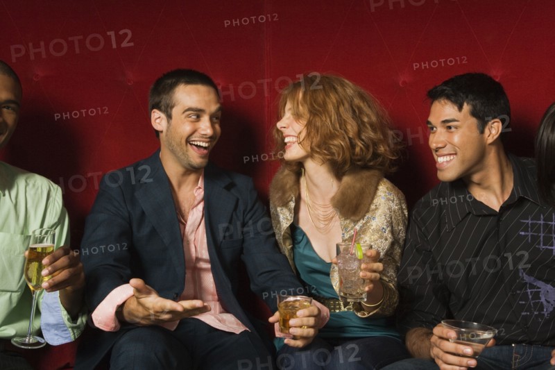 Multi-ethnic friends laughing