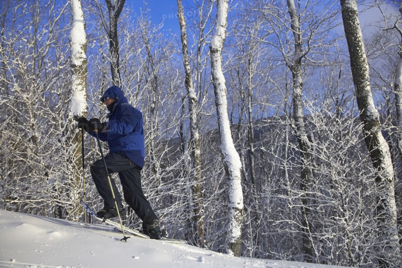 Caucasian man snowshoeing