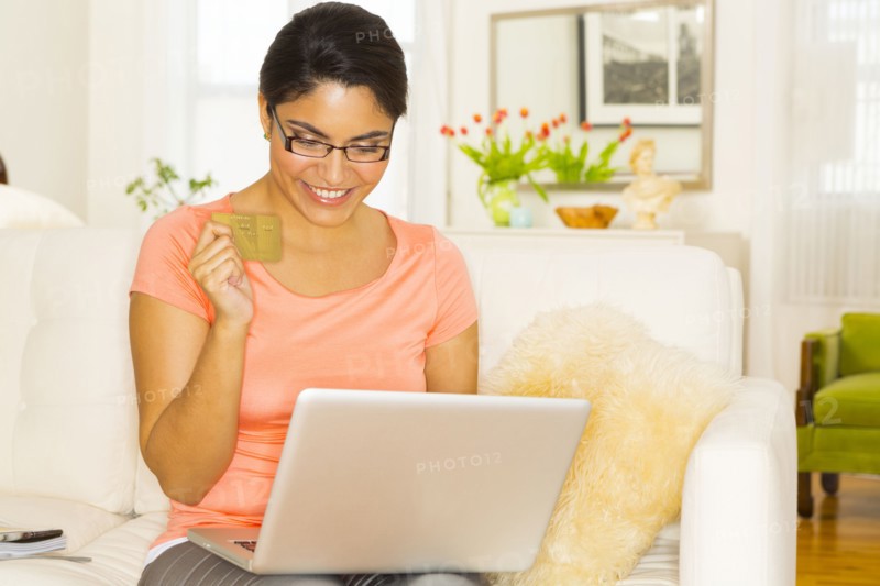 Hispanic woman shopping online