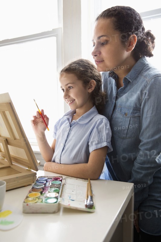 Mother and daughter painting