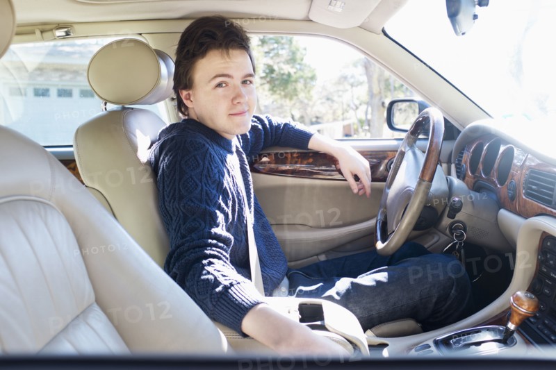 Caucasian man driving car