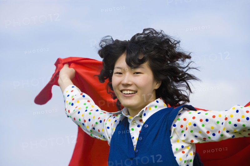 Asian woman with hair blowing