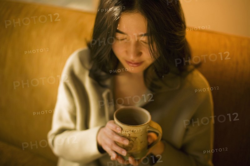 Asian woman drinking tea