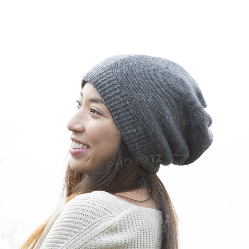 Japanese woman wearing beanie outdoors