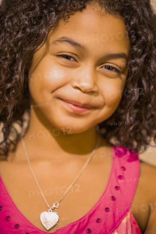 Close up of smiling Hispanic girl