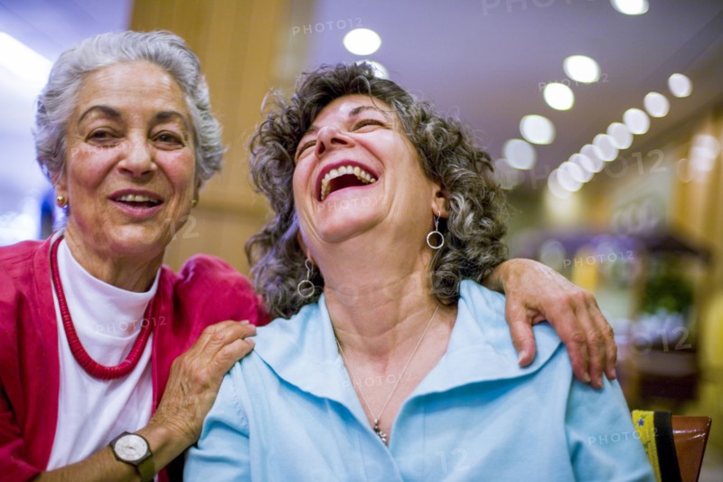Caucasian women laughing