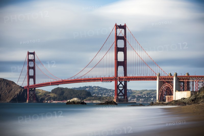 Time lapse view of ocean under Golden Gate Bridge