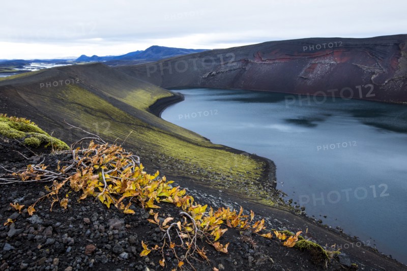 High angle view of volcanic rock and river in remote landscape