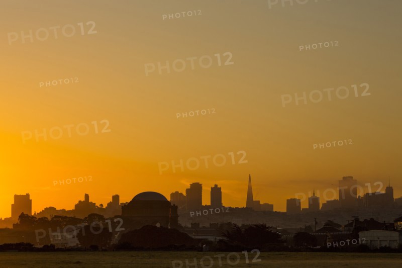 Silhouette of San Francisco city skyline at sunrise