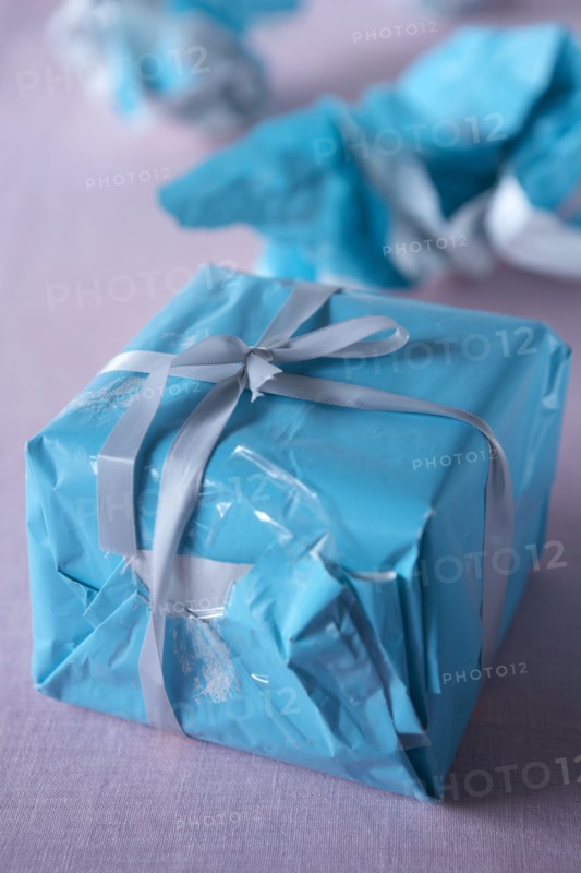 Christmas gift wrapped with wrinkled paper