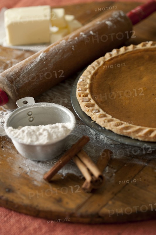 Baking ingredients and homemade pumpkin pie