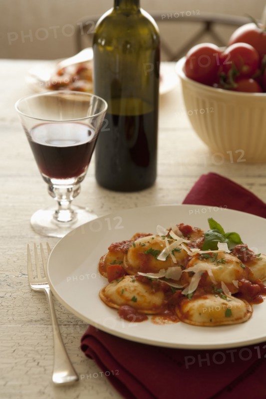 Ravioli in tomato sauce and red wine