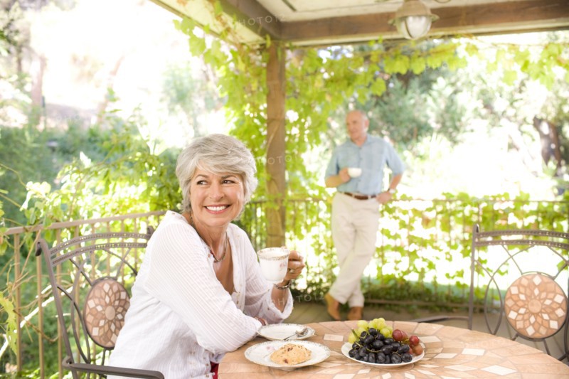 Woman having breakfast outdoors