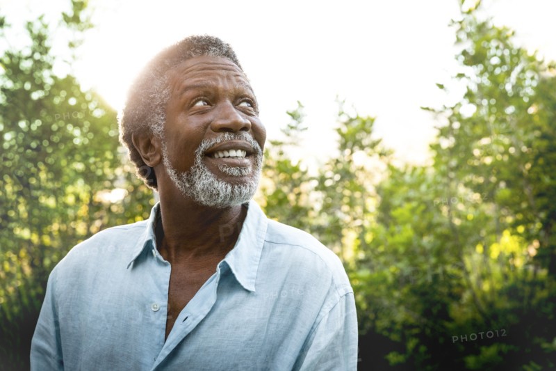 Senior man smiling outdoors