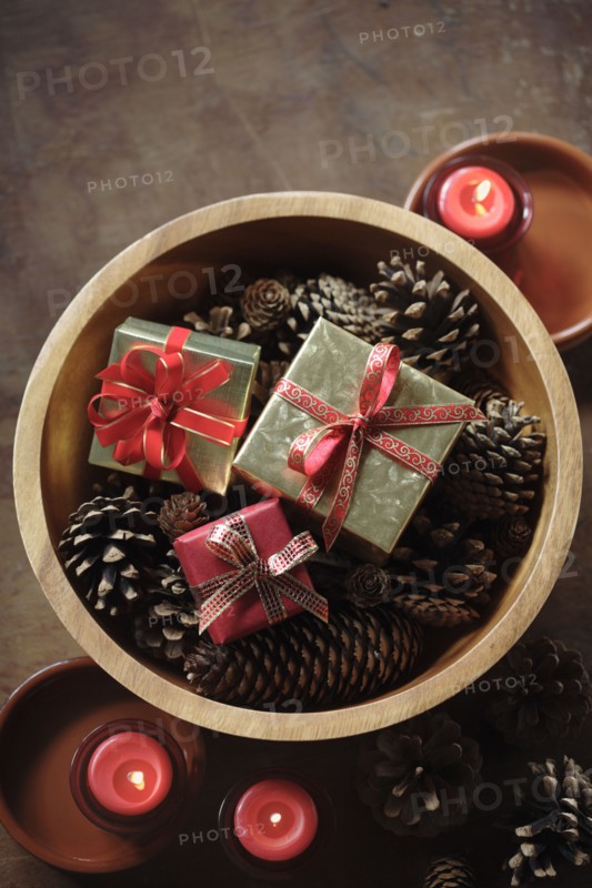 Christmas gifts in wooden bowl