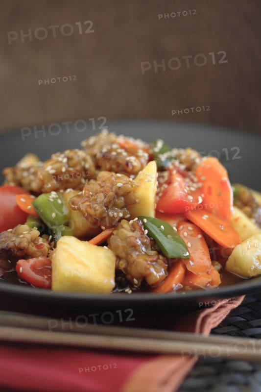 Soy tempeh stir fry on plate