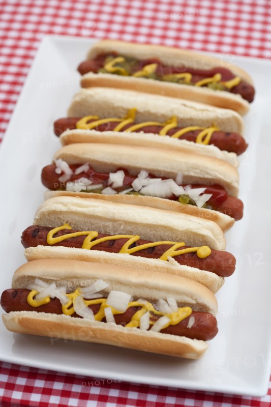Close up of plate of hot dogs