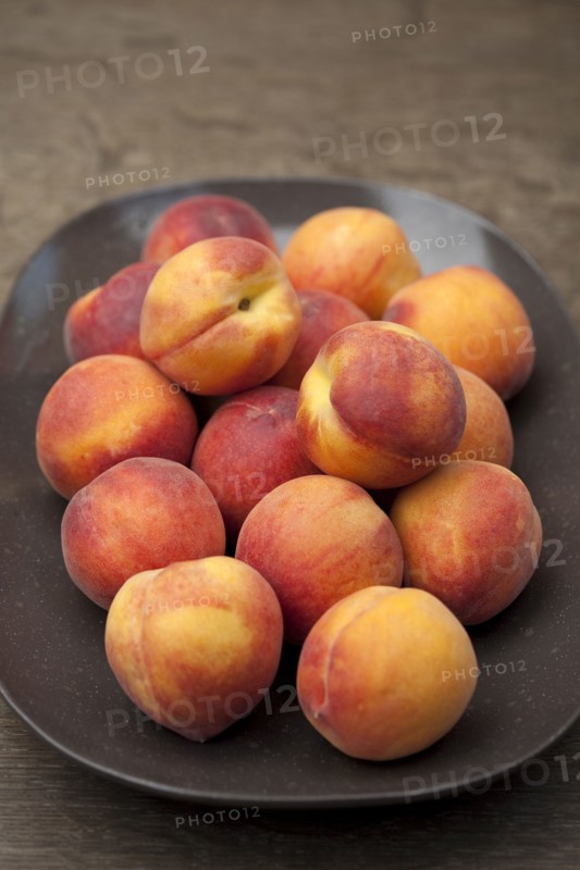 Close up of peaches on plate