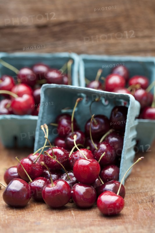Close up of bing cherries in cartons