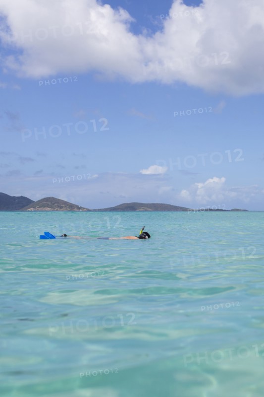 Caucasian man snorkeling in tropical ocean