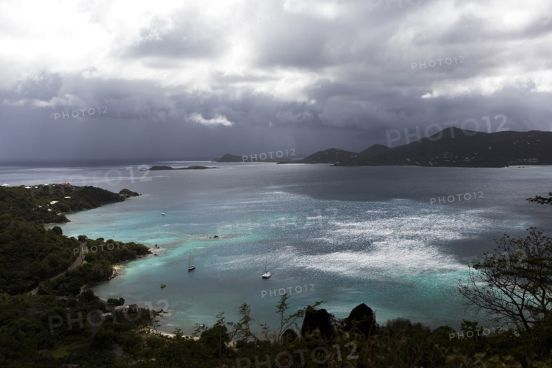 Aerial view of ocean and lush coastline