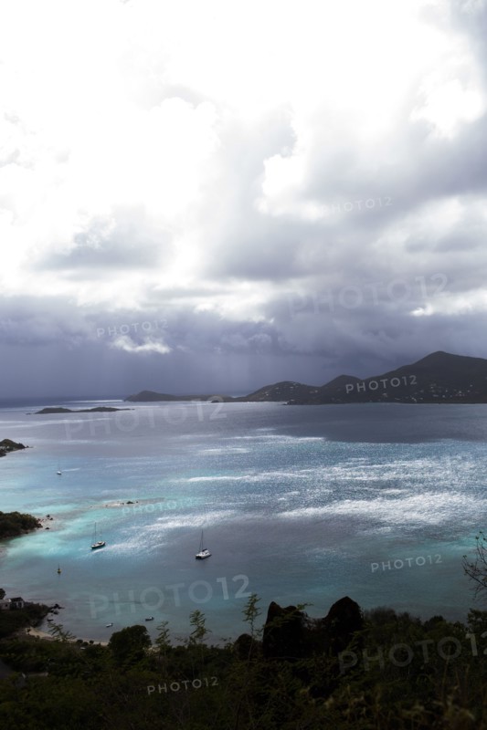 Aerial view of ocean and lush coastline