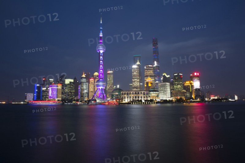 Illuminated city waterfront