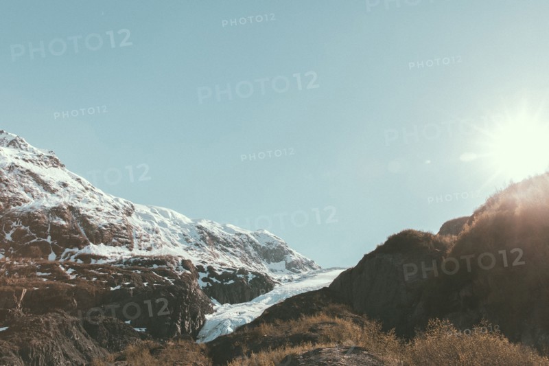 Sunbeams on snowy mountain