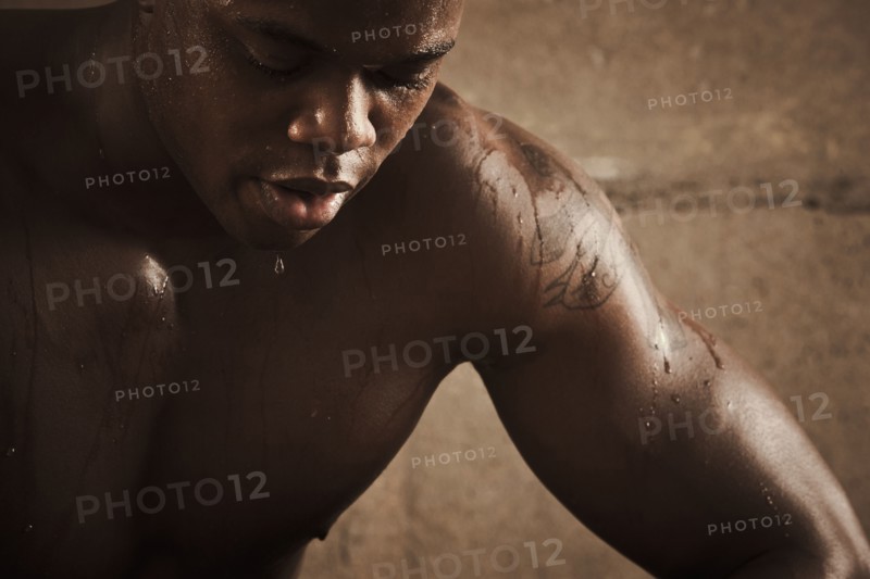 African American man sweating after exercise