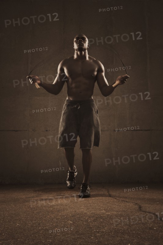 African American man jumping rope