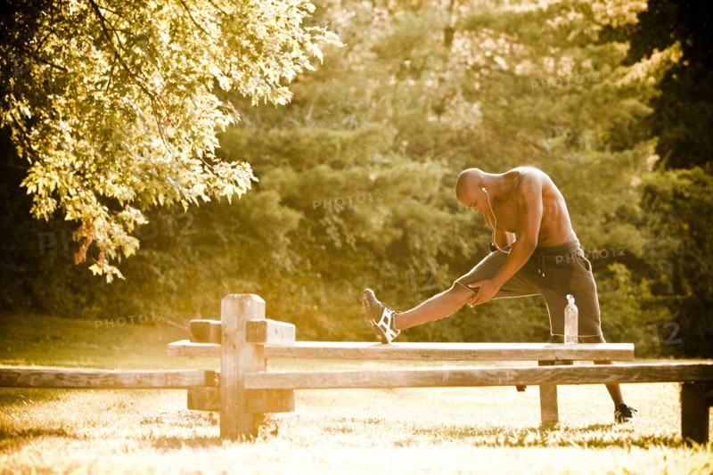 African American man stretching before exercise