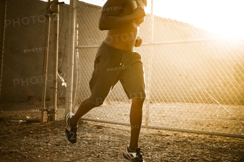 African American man jogging