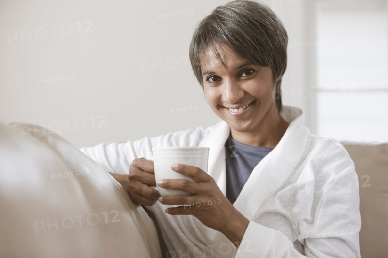 Native American woman drinking coffee