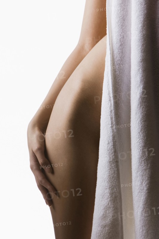 Caucasian woman's bare hip