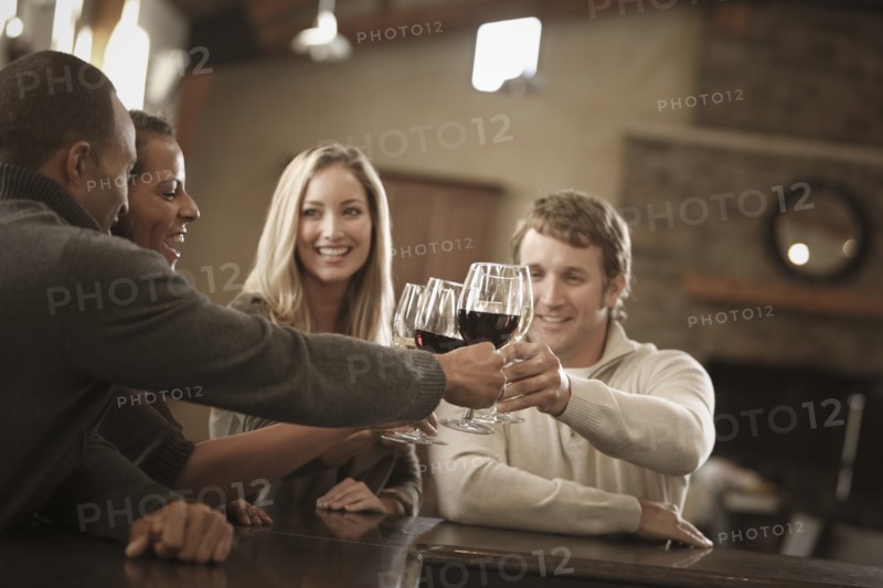 Friends drinking wine together