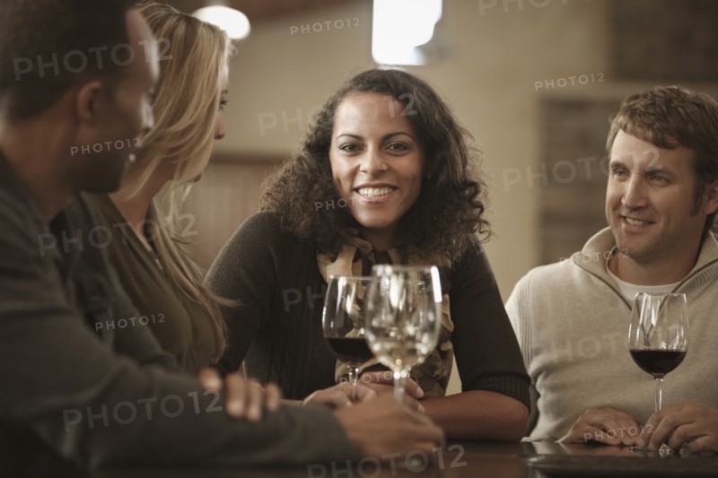 Friends drinking wine together