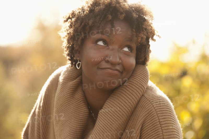 Smiling Black woman outdoors