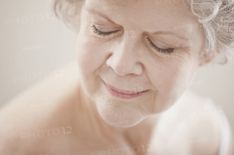 Caucasian woman with eyes closed