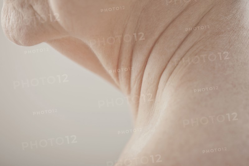 Close up of Caucasian woman's aging neck